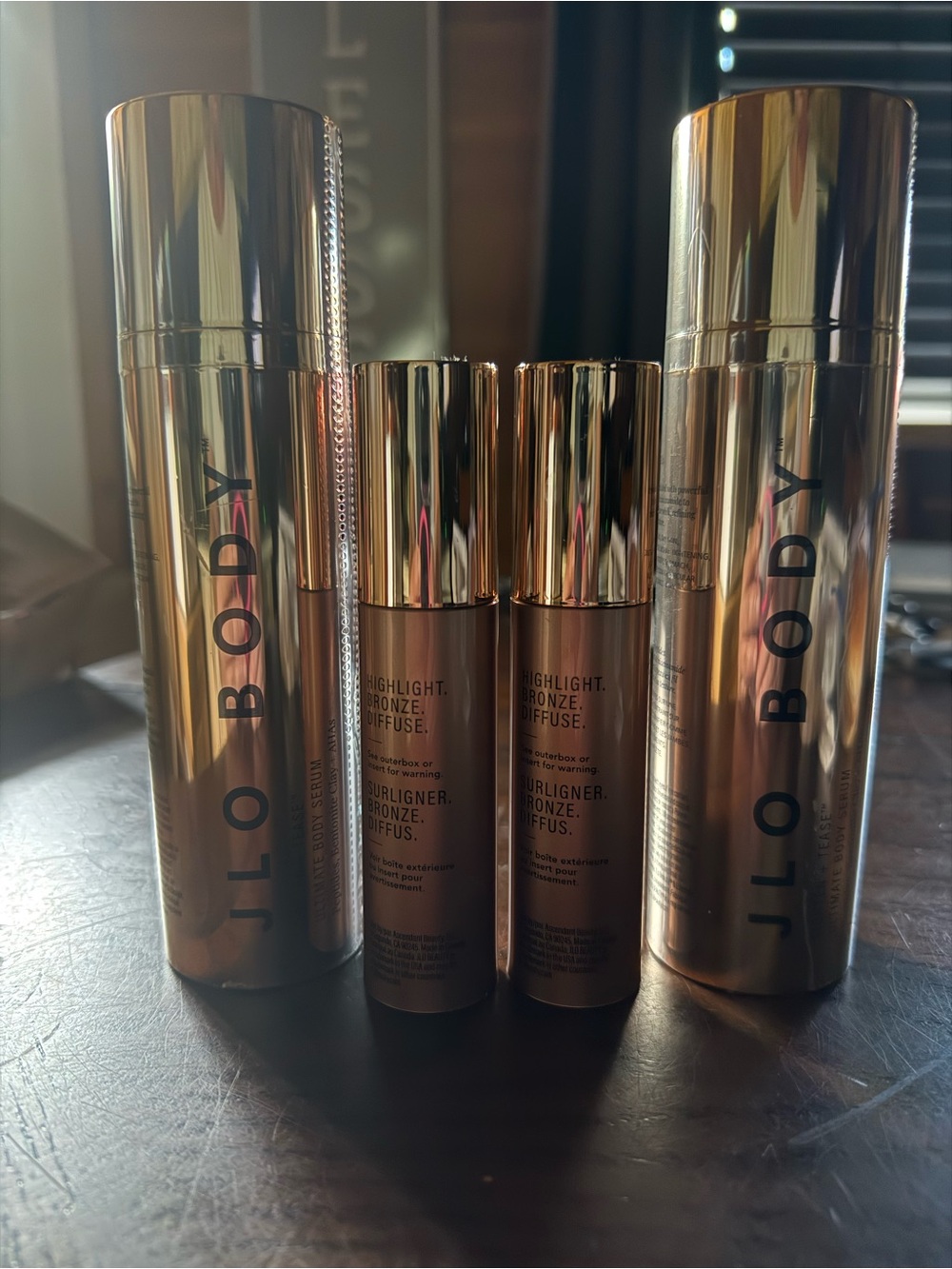 JLO BODY Radiant Bronze Highlighter - Rose Gold